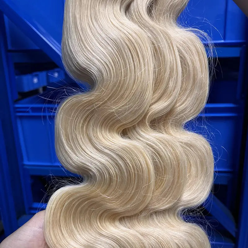 12A #613 Tissage de cheveux bruts blonds ondulés