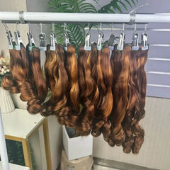 Cheveux tissés bruts 9A à double tirage bouclés et rebondissants